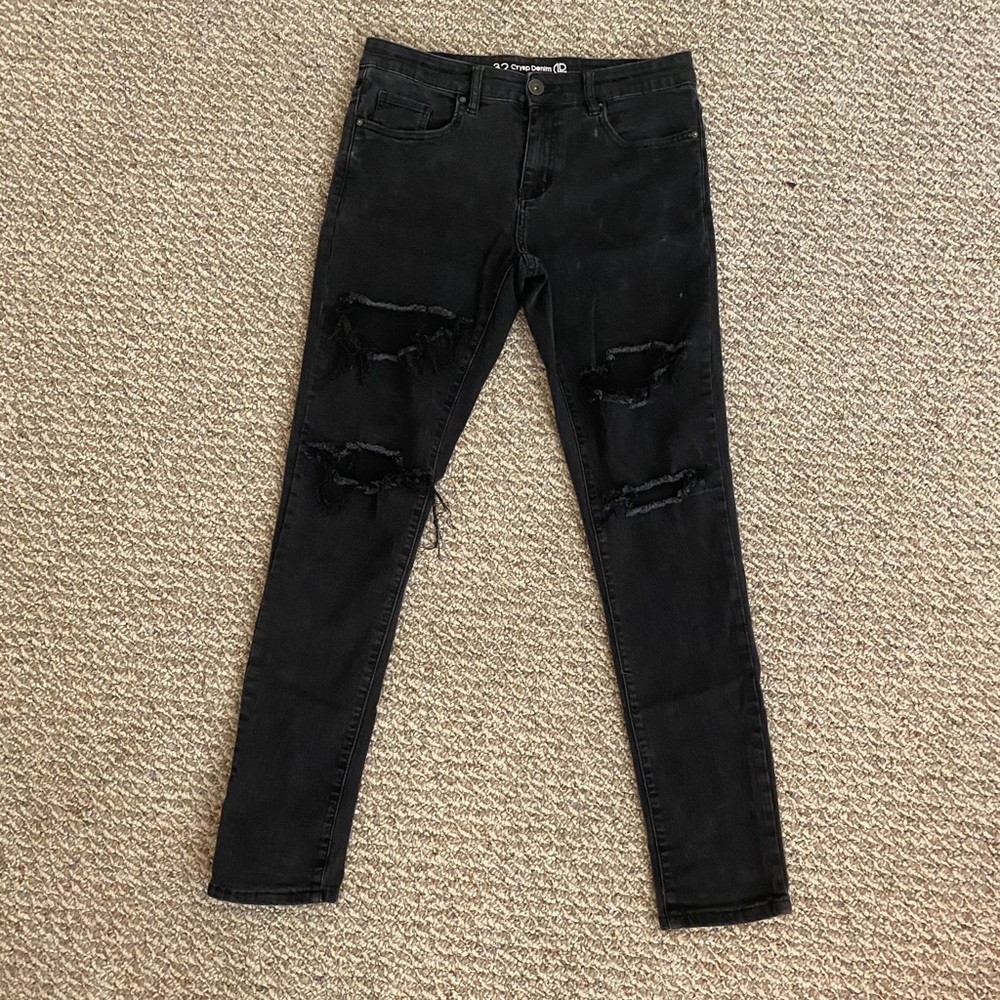 Black ripped “CryspDemin” skinny jeans